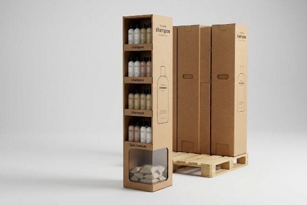 Cardboard quarter pallet display with First Class Shampoo bottles, showcasing a weighted false bottom and shipping boxes on a wooden pallet.