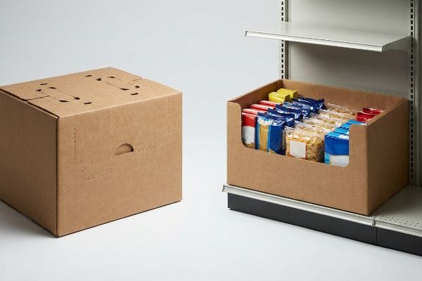 Corrugated shelf-ready packaging: closed master carton with perforations, open retail display box with food.