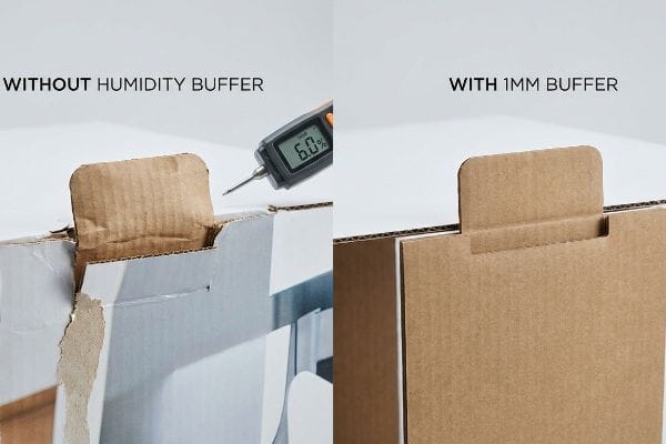 Damaged cardboard tab Without Humidity Buffer, with a moisture meter reading 6.0%, compared to a pristine tab With 1mm Buffer.