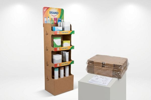 Cardboard Display Flat-Pack Assembled Brand corrugated cardboard display stand with products, beside flat-packed components and assembly instructions.