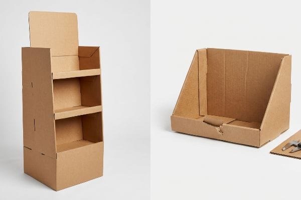 Cardboard Display Types Natural brown corrugated cardboard floor stand display and a smaller countertop merchandiser, illustrating different retail display types.