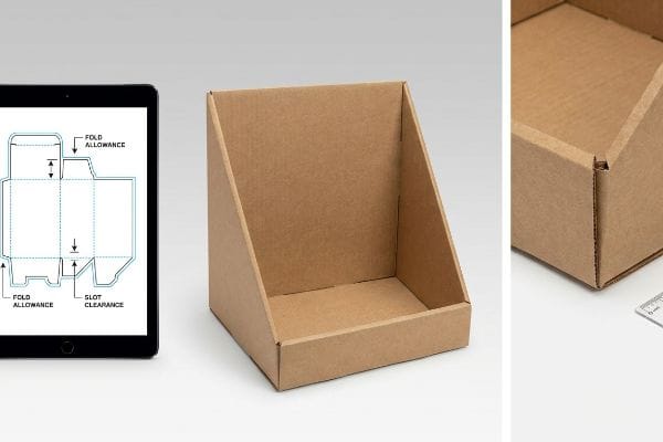 Corrugated Display Box Dieline Brown corrugated display box next to a tablet showing a digital dieline with Fold Allowance and Slot Clearance for accurate assembly.