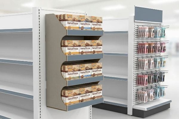 Sidekick Hook Displays A retail aisle showcases a sidekick display with HanaTrack snack boxes and a hook display holding blister-packed cosmetics.