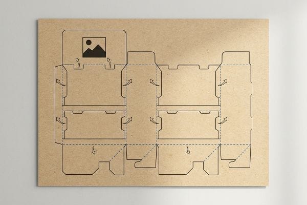 A flat die-cut template for a point of purchase display box, featuring fold and cut lines on natural kraft paper.
