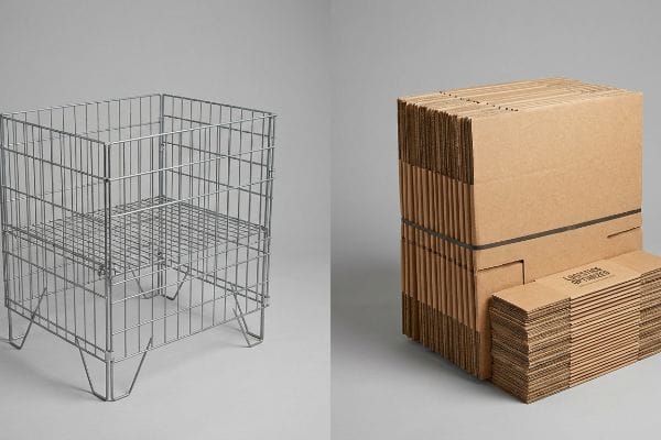 Silver metal wire display basket next to flat-pack corrugated boxes, one showing 'Logistics Optimized' text, highlighting efficient shipping.
