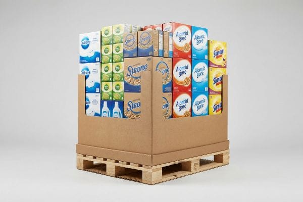 Corrugated cardboard pallet display on wooden base, showcasing Dribune, Simone Multigrain, Alomix Bore, and Sundry product boxes.