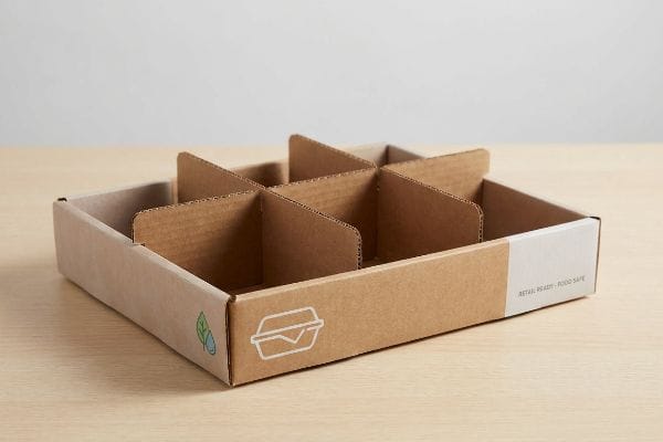 Brown corrugated cardboard deli tray with six modular dividers, displaying 'Retail Ready - Food Safe' text and eco-friendly icons.