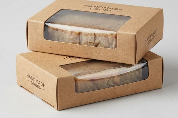 Two stacked kraft paper window boxes with clear windows, each displaying 'Handmade Goods' branding.