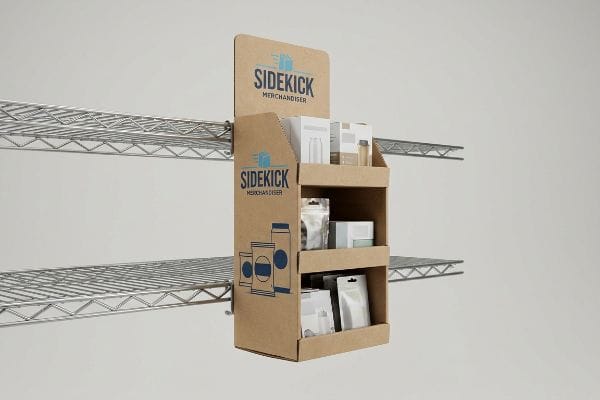 Sidekick Merchandiser Display Brown corrugated cardboard Sidekick Merchandiser hanging display with two tiers of packaged products, mounted on a retail wire shelf.