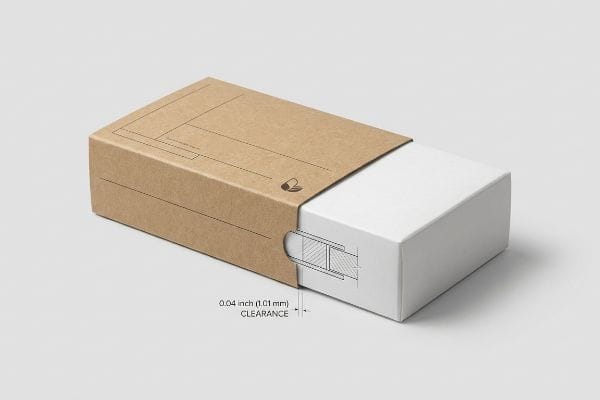 Brown Kraft paper sleeve packaging partially revealing a white box, highlighting 0.04 inch (1.01 mm) Clearance.