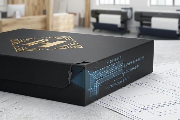 Black box, gold 3D embossed logo, torn corner illustrating Fiber Tension, 3D Embossing Matrix, Exclusion Zone, Structural Integrity.
