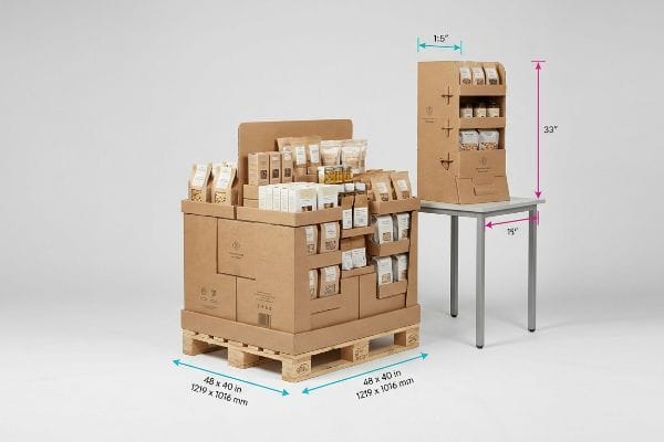 Pallet and Counter Displays Kraft corrugated cardboard pallet display, 48x40 inches, filled with packaged goods, next to a 15-inch wide counter display, 33 inches tall, on a table.