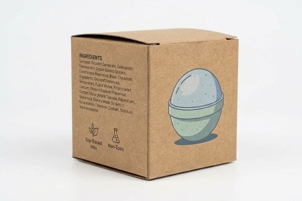 Kraft Bath Bomb Box Brown kraft paper bath bomb box, displaying "Ingredients" list, "Soy-Based Inks," "Non-Toxic" certification, and a bath bomb illustration.