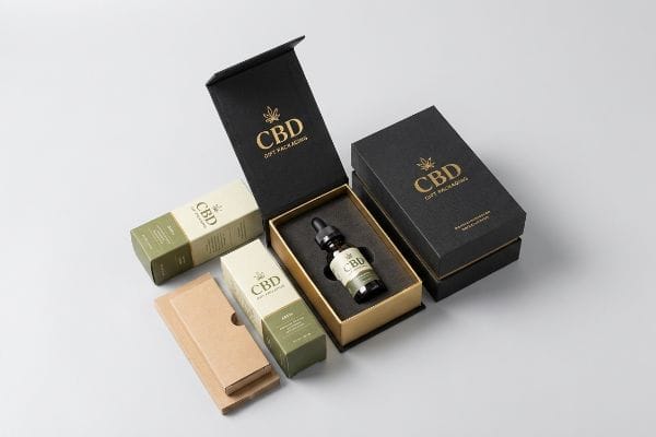 CBD Gift Packaging Boxes An array of premium Cbd Gift Packaging boxes, including black and gold foil gift boxes with a dropper bottle, and cream and olive green retail boxes.
