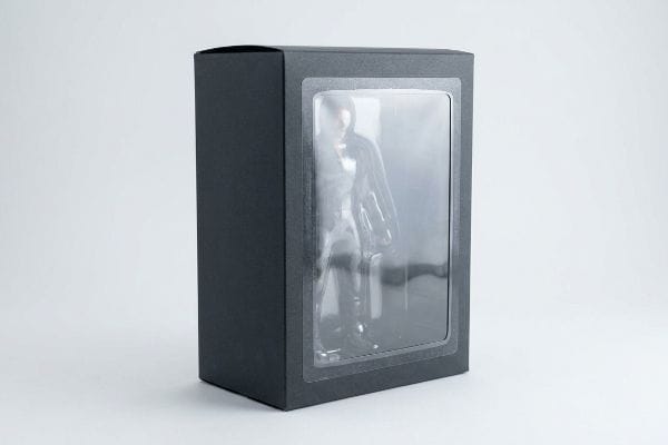 Black Figure Display Box Black paperboard box with a clear viewing window showcasing a dark action figure, ideal for high-end collectibles packaging.