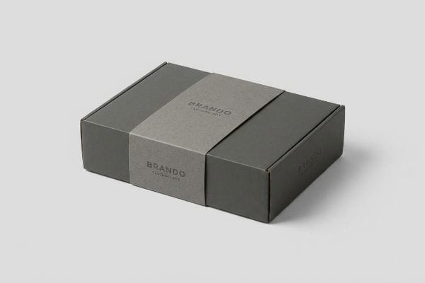 A premium dark gray Brando Clothing Box is elegantly wrapped with a lighter gray band, featuring the brand name.