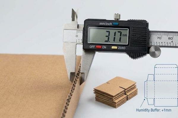 Corrugated cardboard thickness measured by digital caliper at 3.17mm, with a humidity buffer diagram.