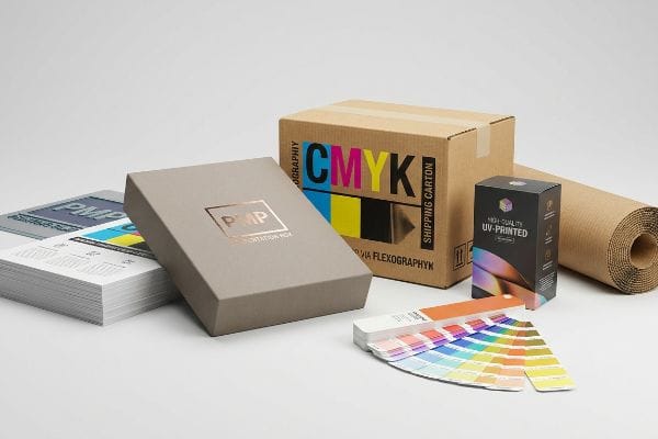 Packaging and print samples: PMP Presentation Box with gold foil, Cmyk Shipping Carton via Flexography, High-Quality Uv-Printed box, and Pantone swatches.