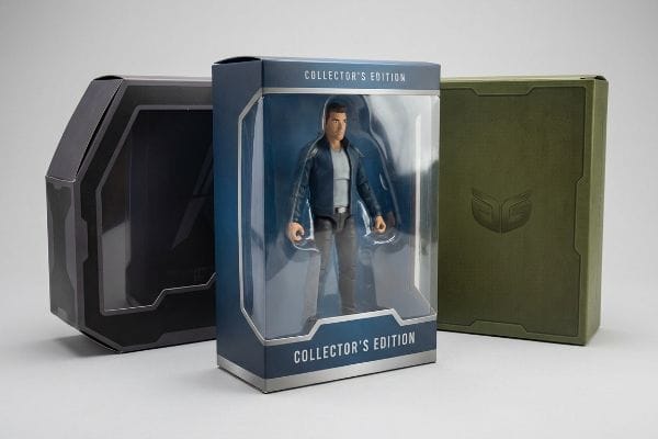 Collector's Edition Packaging Three collector's edition packaging designs: a blue action figure box with 'Collector's Edition' text, a dark grey geometric box, and a green textured box with an embossed logo.