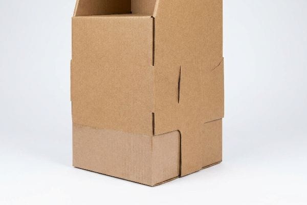 Brown heavy-duty corrugated box base, showing interlocking flaps and visible fluting for structural integrity.