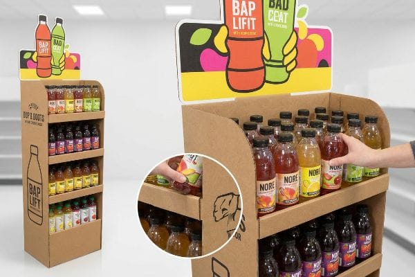 Corrugated cardboard POP display showcasing Bap & Doots bottled beverages, with a die-cut header featuring Bap Lifit and Bad Ceat branding.