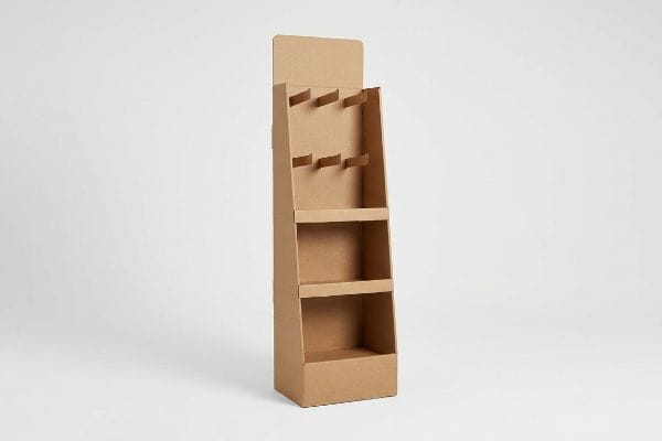 Brown corrugated cardboard retail sidekick display stand with six peg hooks and two shelves, ideal for hanging cosmetic products.