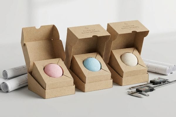 Custom Bath Bomb Boxes Kraft paper Custom Bath Bombs boxes, pink, blue, cream bath bombs in die-cut inserts, digital caliper, blueprints.