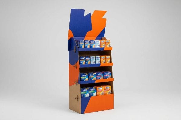 Durex Cardboard FSDU Display Corrugated cardboard FSDU with high-contrast blue and orange graphics, displaying Durex products on four shelves.
