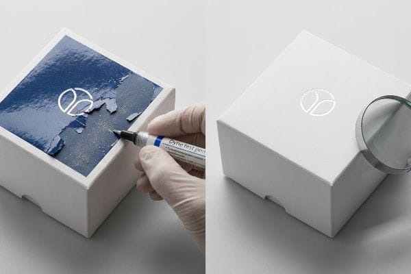 Dyne Test Pen Gloved hand uses a Dyne test pen on a white box with peeling blue coating, revealing logo, contrasted with a pristine box.