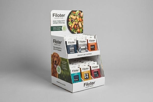 White corrugated Filoter display box, featuring high-fidelity offset printing, product packages, and a golden retriever.