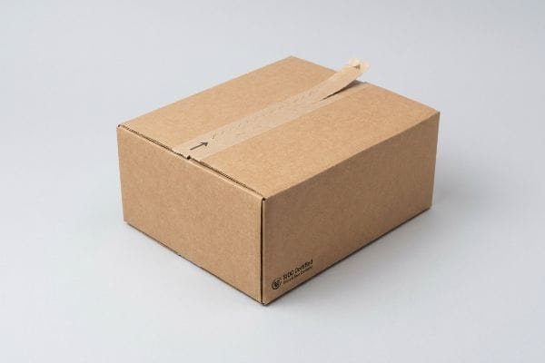 Brown cardboard box with a partially open tear strip and arrow, displaying the SIOC Certified logo for frustration-free packaging.