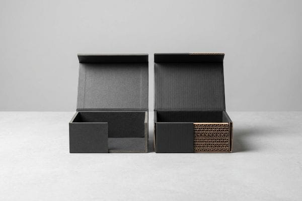 article-image Micro-fluted arches of an E-flute corrugated cardboard substrate are visible in a cross-section view of a premium rigid box wall.