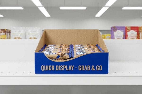 Snack Bar PDQ Display Blue cardboard Quick Display - Grab & Go PDQ box filled with Snack Bars on a retail shelf.