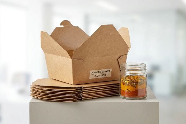 PFAS-Free Spice Packaging Kraft paper food packaging, Pfas-Free Barrier Recyclable, with stacked flat boxes and a spice jar.