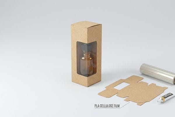 Caixa de papelão Kraft natural para CBD com janela de filme de celulose PLA, frasco âmbar e modelo de caixa plana.