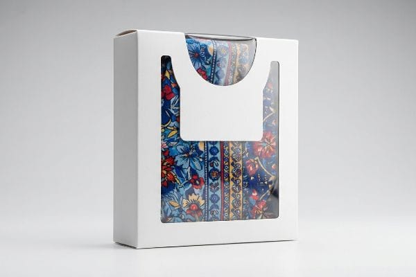 Floral Printed Tights Box White paperboard window box showcasing vibrant floral patterned printed tights through a clear film, ideal for retail packaging.