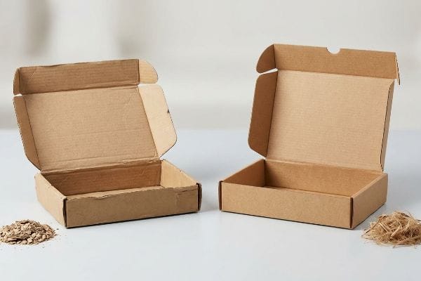 Virgin Kraft Mailer Boxes Open virgin kraft corrugated mailer boxes, ideal for direct-to-consumer e-commerce shipping, with eco-friendly void fill.