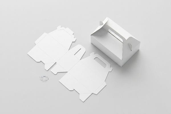 White Gable Box Packaging Two flat die-cut white paperboard templates and an assembled white gable box with a handle.