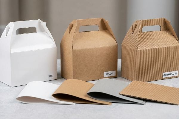 Que tipo de papel utiliza para fazer caixas de cartão para telhados de duas águas?