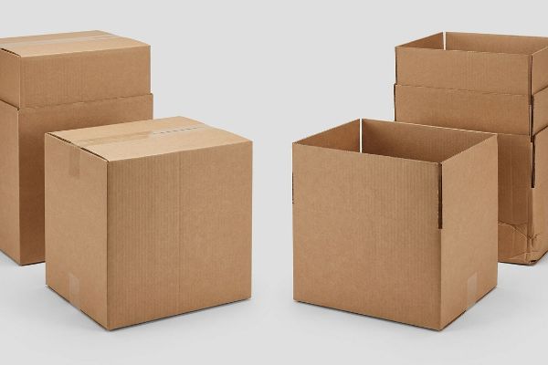 Rsc Hsc Cardboard Boxes Brown corrugated cardboard boxes, featuring both closed Regular Slotted Containers (RSC) and open Half Slotted Containers (HSC) for shipping.